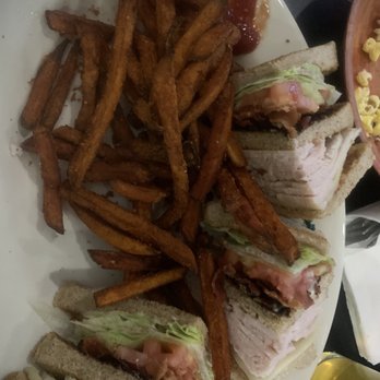 Coop's Bar & Grille - Turkey Club sandwich with sweet potato fries - Bars Near Me - Quincy, Massachusetts