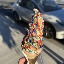 Twist cone w/ rainbow sprinkles Twist cone w/ rainbow sprinkles