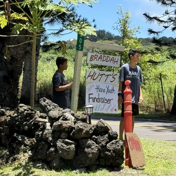 Braddah Hutts BBQ Grill - Street Sign - Barbeque Near Me - Hana, Hawaii