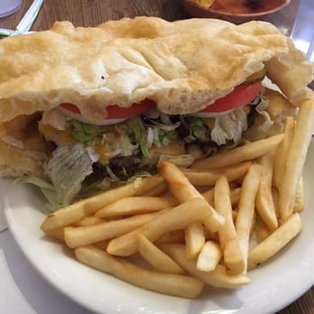 Amigo Cafe - Navajo burger. The two patties are side by side so it's really like two sandwiches. - Mexican Near Me - Kayenta, Arizona Amigo Cafe - Navajo burger. The two patties are side by side so it's really like two sandwiches. - Mexican Near Me - Kayenta, Arizona