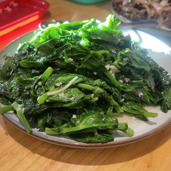 Hu's Cooking - Snow pea leafs - Chinese Near Me - Houston, Texas Hu's Cooking - Snow pea leafs - Chinese Near Me - Houston, Texas