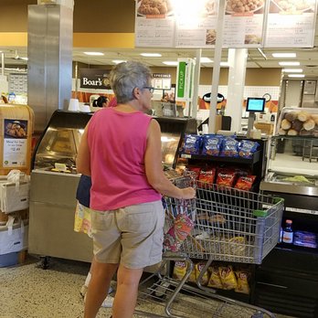 Publix Super Markets - a woman pushing a shopping cart - Bakeries Near Me - Sun City Center, Florida Publix Super Markets - a woman pushing a shopping cart - Bakeries Near Me - Sun City Center, Florida