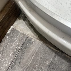 K & C Plumbing - Water coming from the base