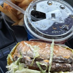 Double cheese burger fries and a drink Double cheese burger fries and a drink