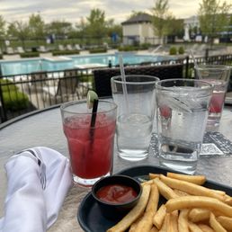 Blueberry cocktail with nearby pool
