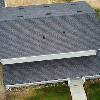 Green's Roofing - Front rooftop with wrap around porch - Roofing Near Me