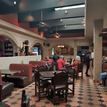 El Fenix - people sitting at tables in a restaurant - Mexican Near Me - Plano, Texas El Fenix - people sitting at tables in a restaurant - Mexican Near Me - Plano, Texas