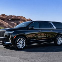 Phoenix Black Car - Luxury Cadillac Escalade SUV with professional chauffeur service for airport, executive, and event transportation.