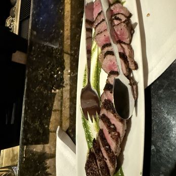 The Capital Grille - Sliced dry aged ny strip - Steakhouses Near Me - Las Vegas, Nevada The Capital Grille - Sliced dry aged ny strip - Steakhouses Near Me - Las Vegas, Nevada
