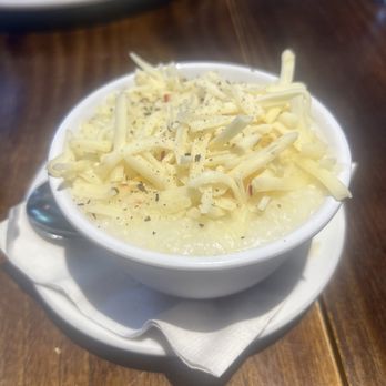 Famous Toastery - Grits with pepper, jack cheese - Breakfast & Brunch Near Me - Charlotte, North Carolina Famous Toastery - Grits with pepper, jack cheese - Breakfast & Brunch Near Me - Charlotte, North Carolina