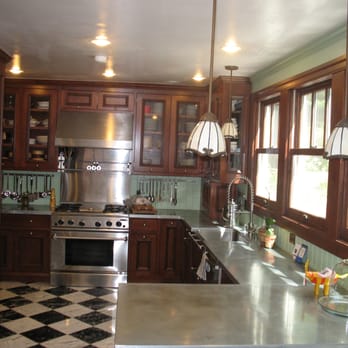 Blei Home Construction - a kitchen with stainless steel appliances - General Contractors Near Me Blei Home Construction - a kitchen with stainless steel appliances - General Contractors Near Me