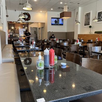 Pho Tan Vinh - a restaurant with tables and chairs - Vietnamese Near Me - Silver Spring, Maryland