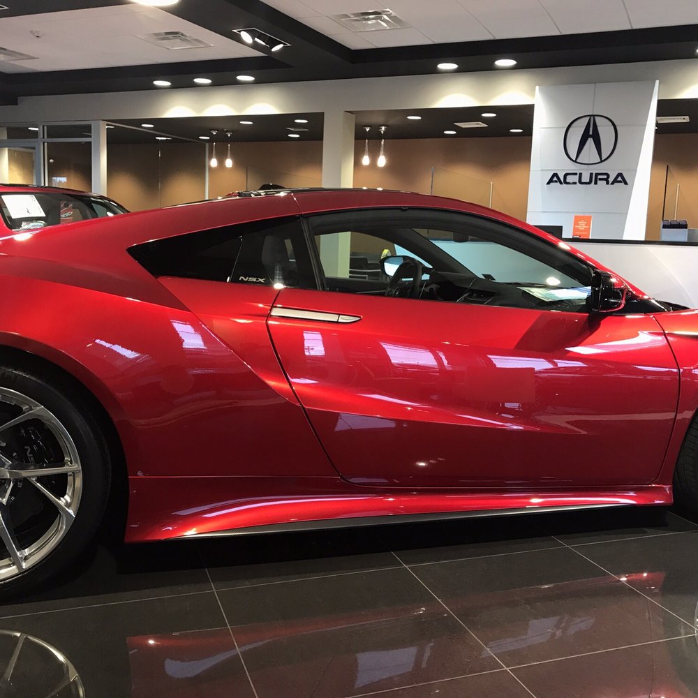 Island Acura- New NSX hybrid sports car listed at ~$200k. Great looking car!!!