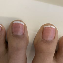 $63 for my mani and for a pedi that came out LIKE THIS. My mani was great.Now, The pedi part the young lady wasn't experienced.