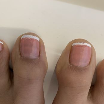 Nail'Tique - $63 for my mani and for a pedi that came out LIKE THIS. My mani was great.Now, The pedi part the young lady wasn't experienced. - Nail Salons Near Me - East Stroudsburg, Pennsylvania