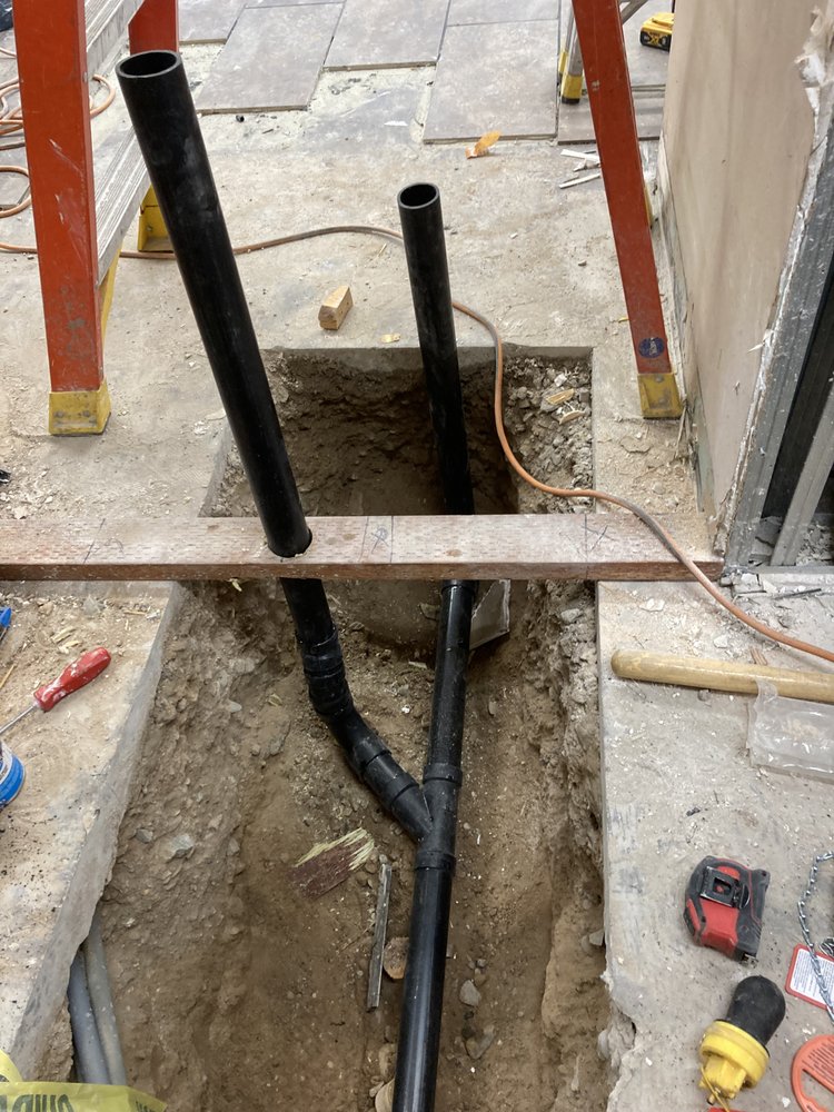 Slide of Jonny’s Plumbing