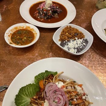 Elote Cafe - Carne asada with rice and beans and sweet potato enchiladas with similar sides. - Bars Near Me - Sedona, Arizona Elote Cafe - Carne asada with rice and beans and sweet potato enchiladas with similar sides. - Bars Near Me - Sedona, Arizona