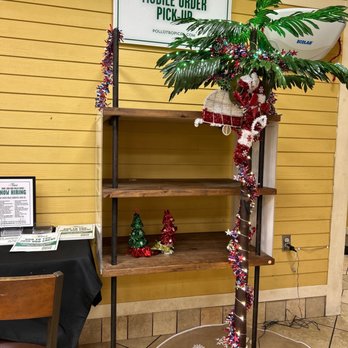 Pollo Tropical - a palm tree decorated with ornaments - Latin American Near Me - Lake Park, Florida Pollo Tropical - a palm tree decorated with ornaments - Latin American Near Me - Lake Park, Florida