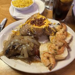 Steak and Sirloin* & Grilled Shrimp Baked Potato Buttered Corn Steak and Sirloin* & Grilled Shrimp Baked Potato Buttered Corn