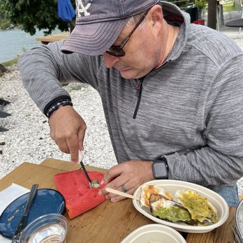 Westcott Bay Shellfish Company - Learning to shuck - Seafood Markets Near Me - Friday Harbor, Washington