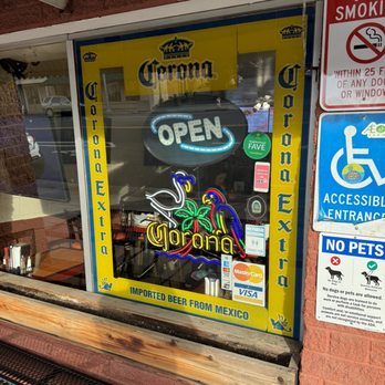 Taqueria Bravo - a sign in the window of a restaurant - Mexican Near Me - Willits, California