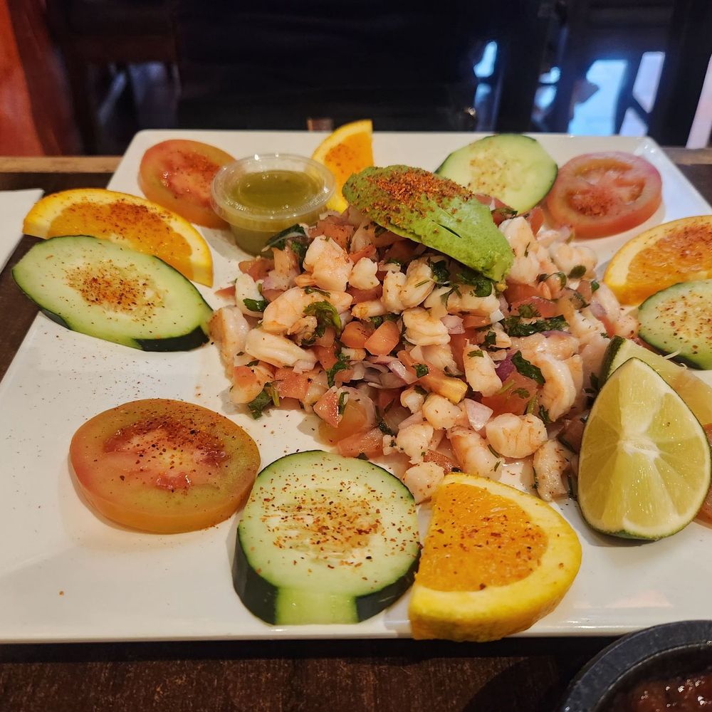 Fonda Don Chon - Shrimp ceviche with tajín on the orange and cucumber slices. - Mexican Near Me - Covina, California