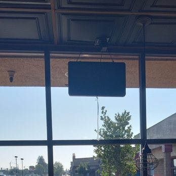 Tacos Chapala - Trash (plastiwrap) dangling from sale sign - Mexican Near Me - Stockton, California Tacos Chapala - Trash (plastiwrap) dangling from sale sign - Mexican Near Me - Stockton, California