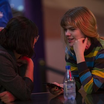 DNA’s Comedy Lab - two women sitting at a table - Comedy Clubs Near Me - Santa Cruz, California DNA’s Comedy Lab - two women sitting at a table - Comedy Clubs Near Me - Santa Cruz, California