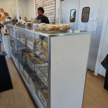 Bialy's Bagels - a woman behind the counter - Bagels Near Me - Cleveland, Ohio Bialy's Bagels - a woman behind the counter - Bagels Near Me - Cleveland, Ohio