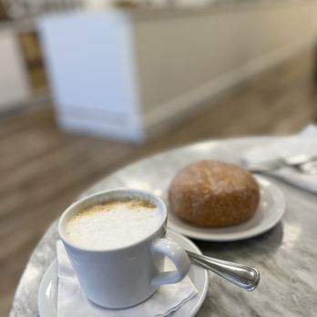 Cafe Breizh Henderson - Cappuccino with custard beignet - Bakeries Near Me - Las Vegas, Nevada Cafe Breizh Henderson - Cappuccino with custard beignet - Bakeries Near Me - Las Vegas, Nevada