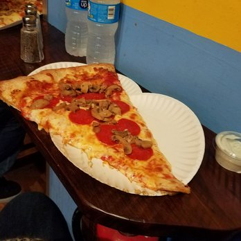 Benny Damato's - My slice barely fitting on the counter - Pizza Near Me - Norfolk, Virginia