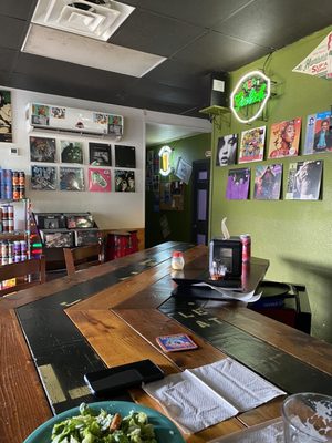 Photo of Hampton Station - Tampa, FL, US. Bar with view of bathroom and records.