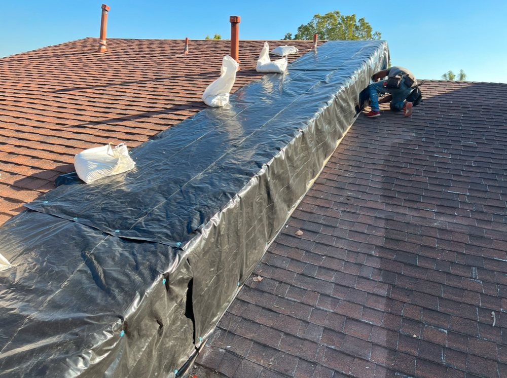 Slide of TopStamp Roofing
