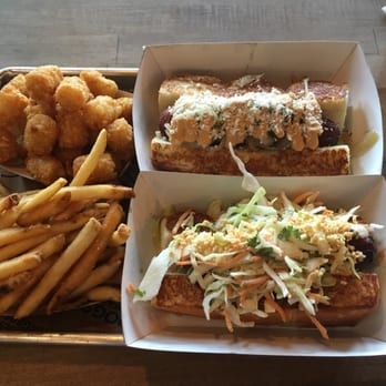 Dog Haus - Sandy - Tots and Old Town Dog (top) Fries and the Another Night in Bangkok (bottom) - New American Near Me - Sandy, Utah