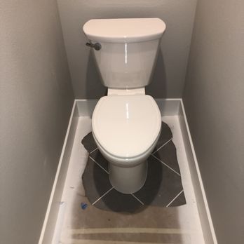 Six Point Plumbing - a toilet in a small bathroom - Water Heater Installation/Repair Near Me Six Point Plumbing - a toilet in a small bathroom - Water Heater Installation/Repair Near Me