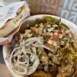 Naf Naf Grill - Shawarma, rice, lemon vinaigrette sauce. With toppings, bowl.