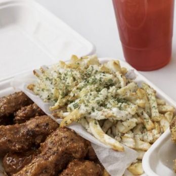 Wings 2 Go - ATL and parm garlic fries, with tropical punch Kool-Aid! So delicious! - Chicken Wings Near Me - Inglewood, California