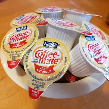 Casa Lupitas - Coffee creamers at our table. - Mexican Near Me - Castaic, California