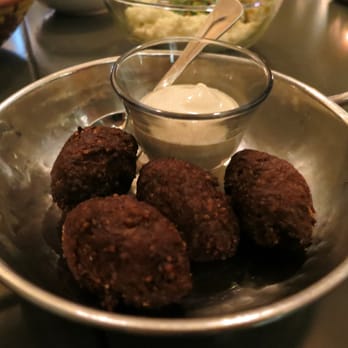 Mamnoon - Kibbeh (Spiced beef, cracked wheat shell, pine nuts) - Lebanese Near Me - Seattle, Washington Mamnoon - Kibbeh (Spiced beef, cracked wheat shell, pine nuts) - Lebanese Near Me - Seattle, Washington