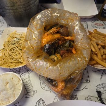 Cap't Loui Seafood Boil - Seafood boil, garlic noodles, rice, and lemon pepper fries - Cajun/Creole Near Me - Los Angeles, California Cap't Loui Seafood Boil - Seafood boil, garlic noodles, rice, and lemon pepper fries - Cajun/Creole Near Me - Los Angeles, California