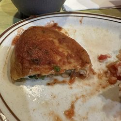 Don Pancho Mexican Restaurant-Ashland City - Half eaten chili 21. One Chile Relleno, 1 Burrito and Rice