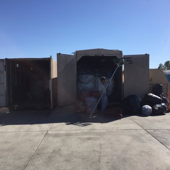 Rosamond Recycle Center - The gentleman that works here, working hard at packing away all the recycling purchased by this business from customers - Recycling Center Near Me - Rosamond, California Rosamond Recycle Center - The gentleman that works here, working hard at packing away all the recycling purchased by this business from customers - Recycling Center Near Me - Rosamond, California