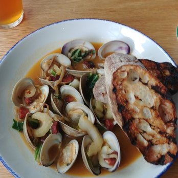 Yellowbelly - Wu-Tang Clams in broth with crusty bread - New American Near Me - St. Louis, Missouri Yellowbelly - Wu-Tang Clams in broth with crusty bread - New American Near Me - St. Louis, Missouri