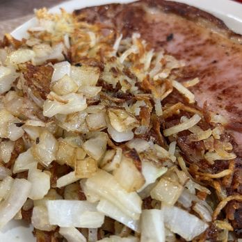 Pioneer Restaurant - Combo #2's hash browns (added onions and well done) and country ham - Diners Near Me - Arlington, Texas Pioneer Restaurant - Combo #2's hash browns (added onions and well done) and country ham - Diners Near Me - Arlington, Texas