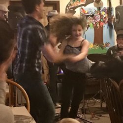 Elim Grove Cottages - Mark and his daughter swing dancing during pizza night. You'll see Mark running from the kitchen for a quick dance!