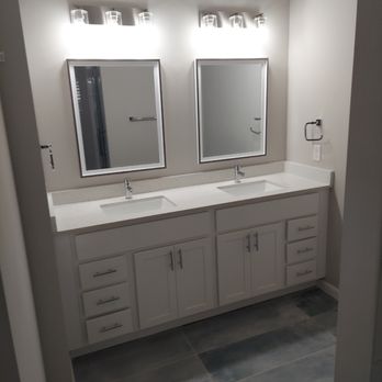 DTX Flooring & Design - a bathroom with double sinks - Flooring Near Me - Plano, Texas