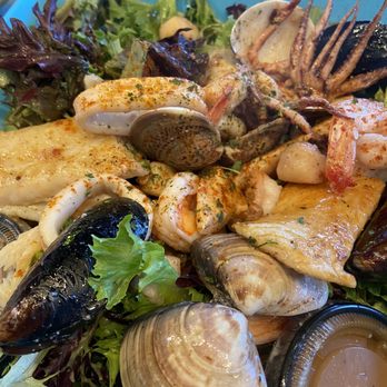 Simply Fish Seafood - Warm seafood salad $19 soo good!! Perfectly seasoned and light for us - Fish & Chips Near Me - Costa Mesa, California