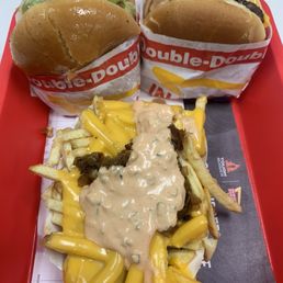 3-by-3s, one with grilled onions and extra spread. And animal style fries YUM 3-by-3s, one with grilled onions and extra spread. And animal style fries YUM