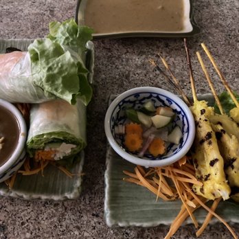 Thai Palace Restaurant - Summer roll and Chicken Satay. Two distinctly different sauces, each delicious. - Thai Near Me - Kalispell, Montana