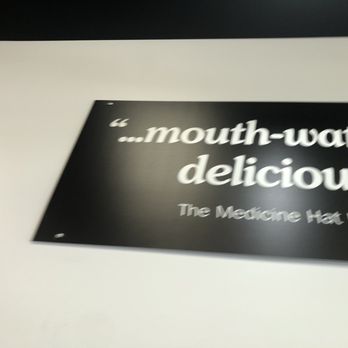 Five Guys - a sign that says mouth water is delicious - Burgers Near Me - Albertville, Minnesota